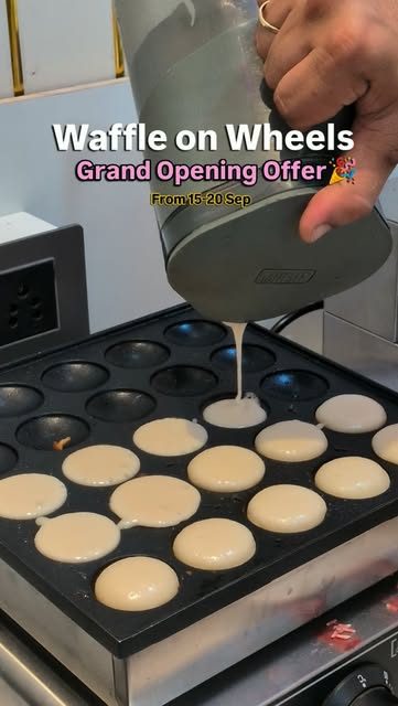 Waffle batter being poured onto the hot iron at Waffle on Wheels